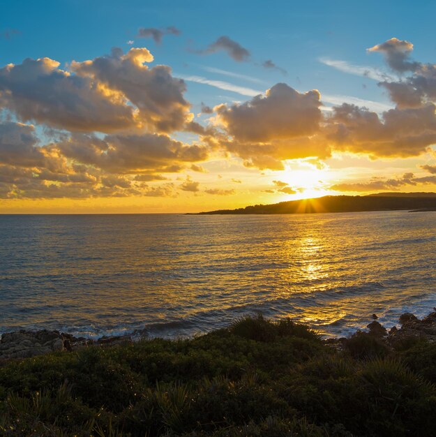 Tramonto colorato su Alghero Italia