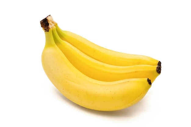 Tre banane fresche isolate on white Banane gialle fresche