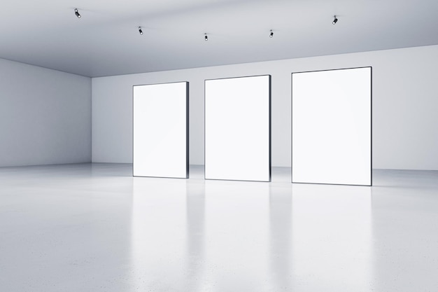 Tre striscioni luminosi bianchi vuoti all'interno della sala grigia con pavimento in cemento e pareti chiare Concetto di presentazione Mockup 3D Rendering