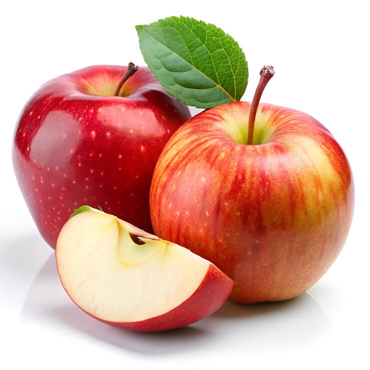 two apples with a green leaf
