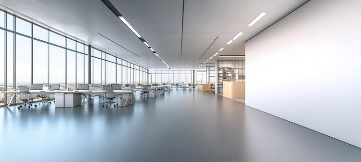 Un ampio e luminoso spazio di lavoro moderno a concetto aperto con un design interno minimalista con grandi finestre, scrivanie, sedie e computer per un ambiente aziendale professionale