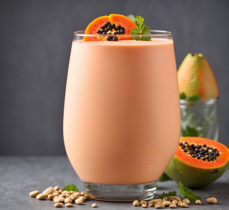 un bicchiere di latte con un frutto e un bicchière di latte