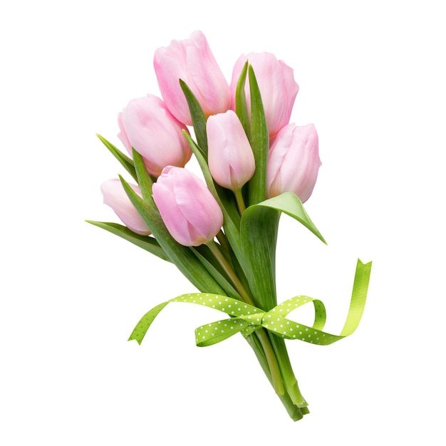 Un bouquet di fiori di tulipano rosso fresco sullo scaffale davanti a una parete di legno