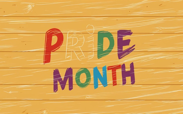 un cartello di legno che dice arcobaleno mese mese mese