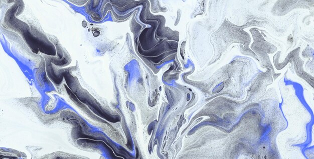 Un dipinto di uno sfondo di marmo blu e bianco