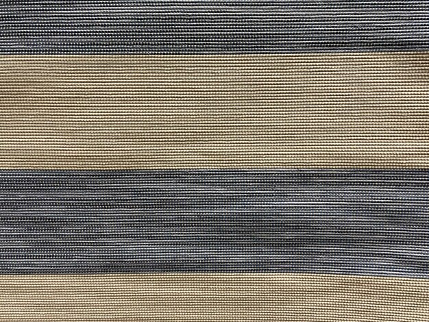 Un disegno del modello astratto di struttura del tappeto, fibra tessile
