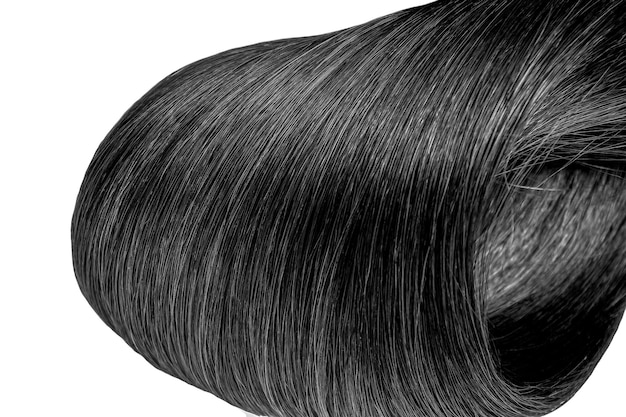 Un disegno in bianco e nero di un'attaccatura dei capelli con una parte superiore nera.