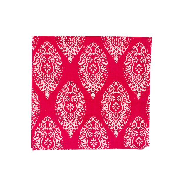 Un fazzoletto da taschino paisley rosa e bianco brillante con uno sfondo bianco.