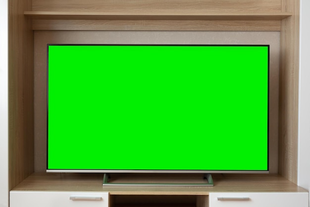 Un'istantanea di una TV con un layout a schermo verde orizzontale