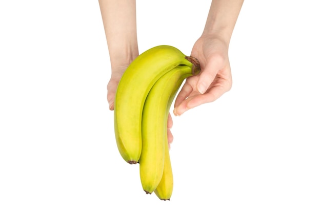 Un mazzo di banane in mano di donna isolato su sfondo bianco