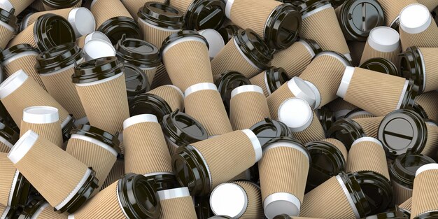 Un mucchio di tazze di caffè di carta vuote Il concetto di riciclaggio dei rifiuti di plastica