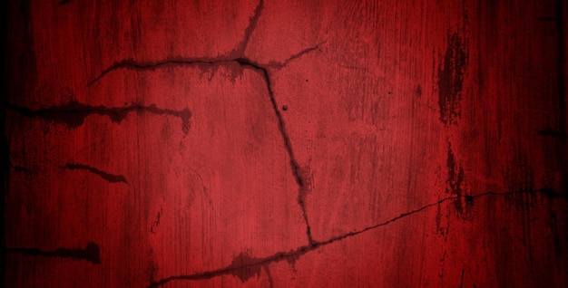 Un muro rosso con una crepa che dice "la parola" sopra "