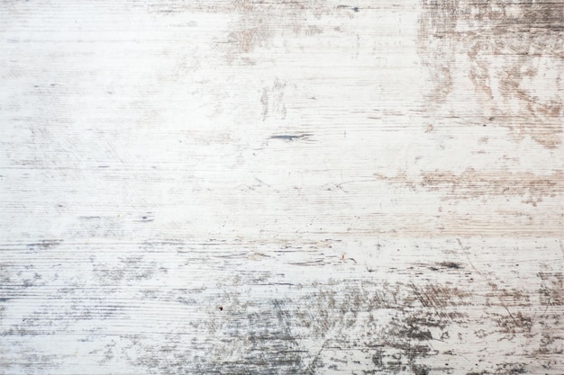 Un pavimento in legno con uno sfondo bianco e una scatola di legno.
