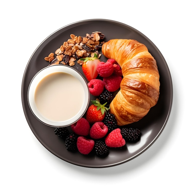 Un piatto di cibo con un croissant, frutti di bosco e una tazza di latte.