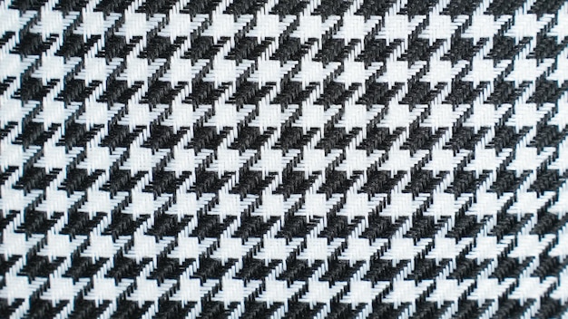 Un primo piano di un tessuto a scacchi bianco e nero.