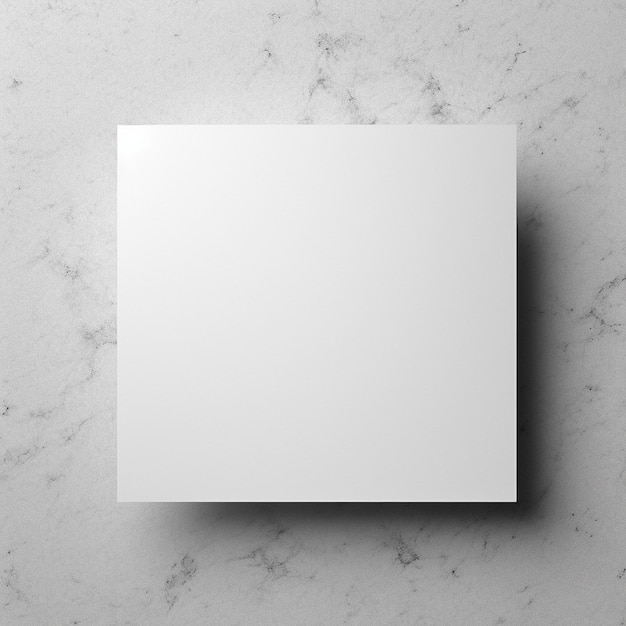 un quadrato bianco è su un muro di pietra grigia con un quadrato Bianco