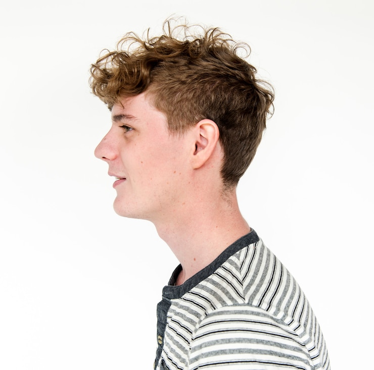 Foto un ragazzo adolescente è in studio shoot