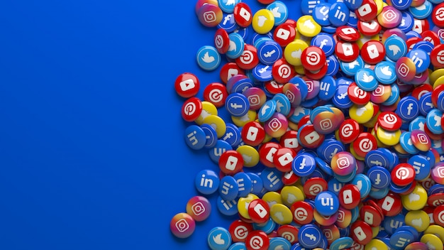 Un sacco di 3d multicolor social network lucido pillole su uno sfondo blu