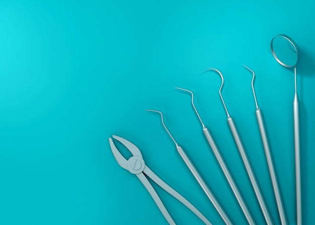 Un set di strumenti dentali su sfondo blu