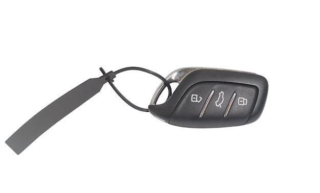 Un set di telecomando della chiave digitale dell'auto con pulsanti sbloccabili e bloccabili isolati su sfondo bianco