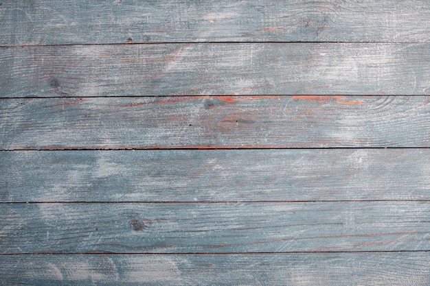 Un tavolo di legno blu con una superficie di legno che dice "la parola" su di esso "