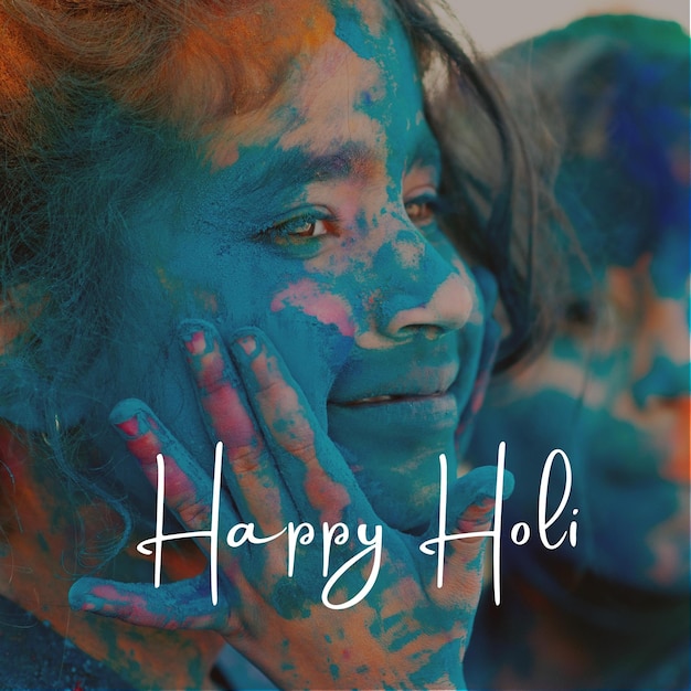 Una bambina che celebra Holi con i suoi amici