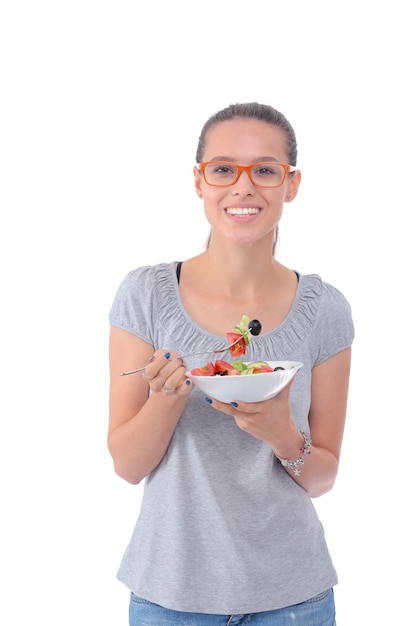 Una bella ragazza che mangia cibo sano Bella ragazza