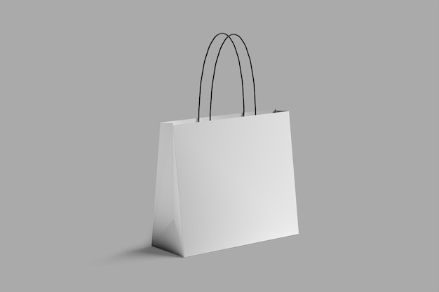 una borsa bianca con una maniglia che dice la lettera m su di essa