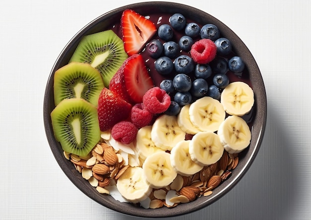 Una ciotola con frutta kiwi, mela, banana e cereali