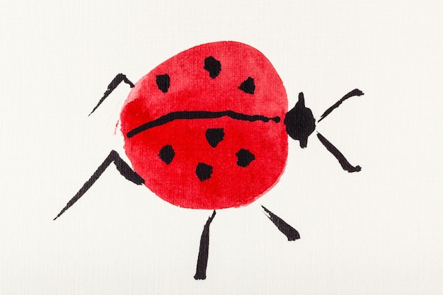 Una coccinella disegnata da acquerelli