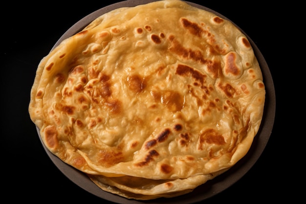 una foto di roti canai