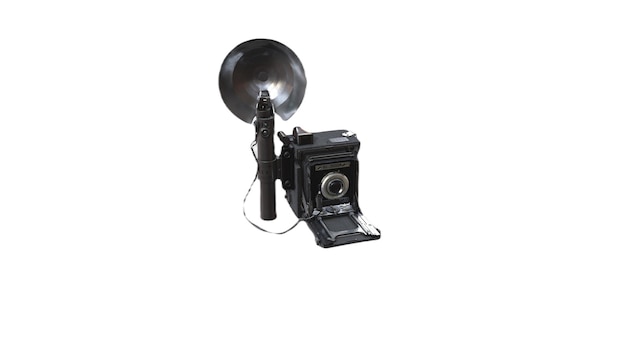 Una macchina fotografica nera con sopra un campanello