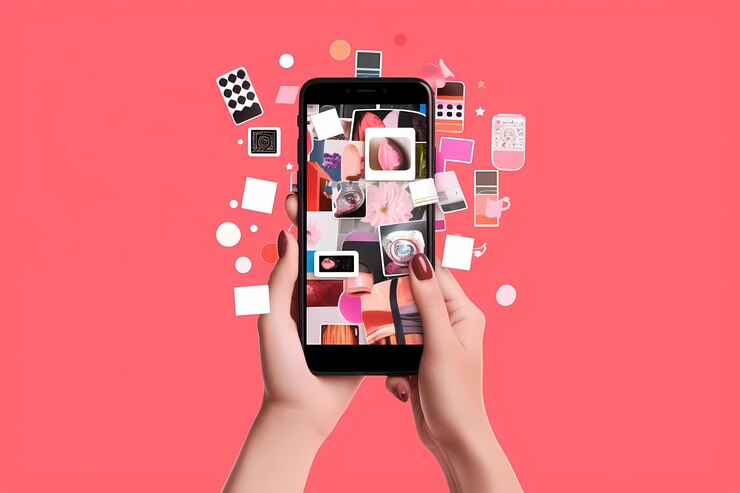 Una mano che tiene un telefono con uno sfondo rosa e una serie di icone diverse su di esso.