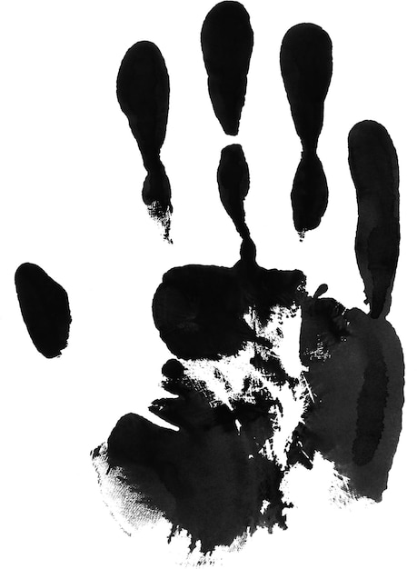Una mano con inchiostro nero sopra
