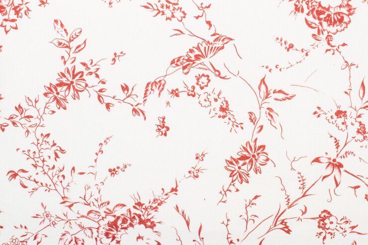 Una trama tessile di fiori rossi in una vista ravvicinata