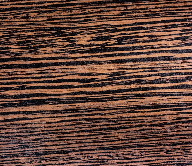 una vecchia piastrella di legno marcio