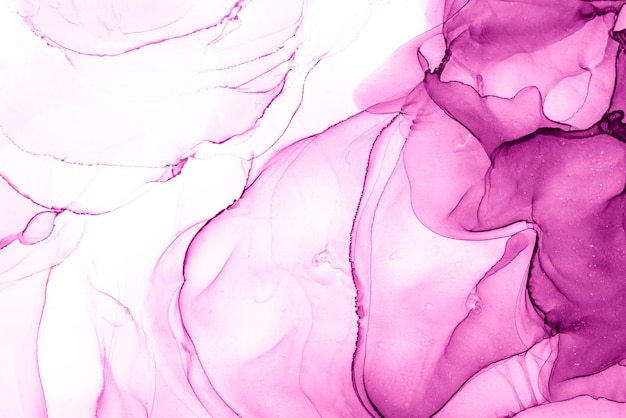 Uno sfondo colorato con un liquido rosa e viola al centro.