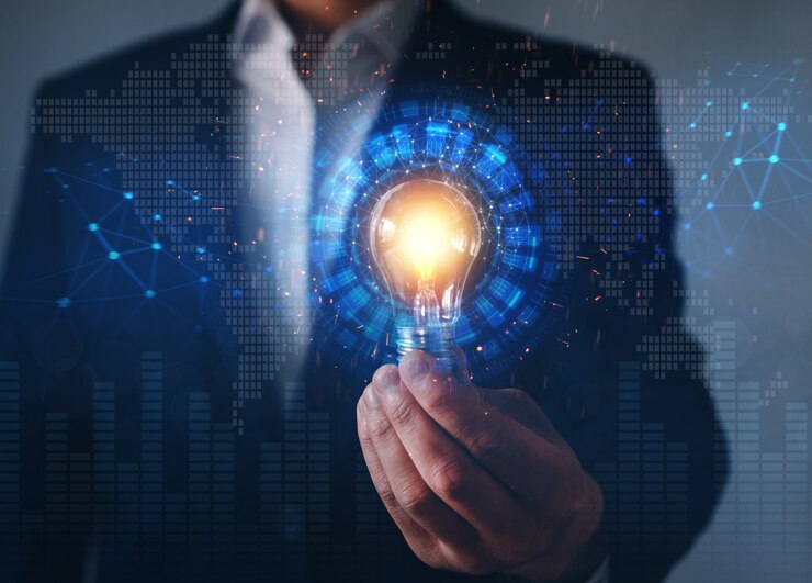 Foto uomo d'affari che tiene lampadina futuristica