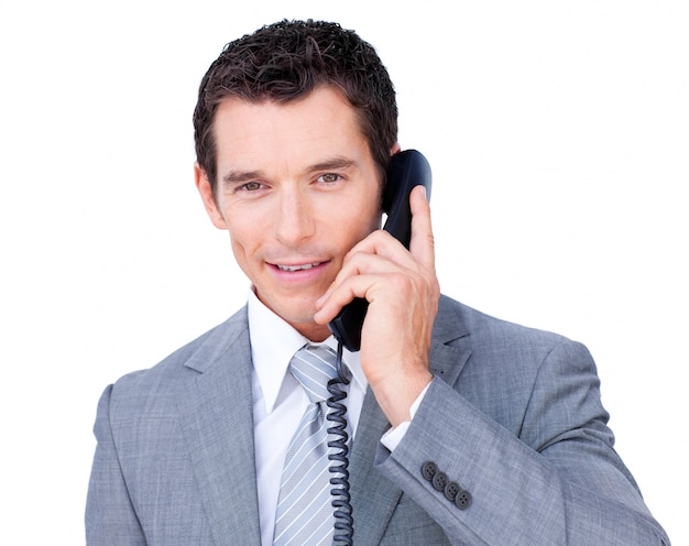 Uomo d&#39;affari sicuro che parla sul telefono