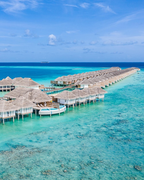 Vacanze sull'isola paradisiaca delle Maldive Paesaggio aereo tropicale paesaggio marino laguna acqua ville resort