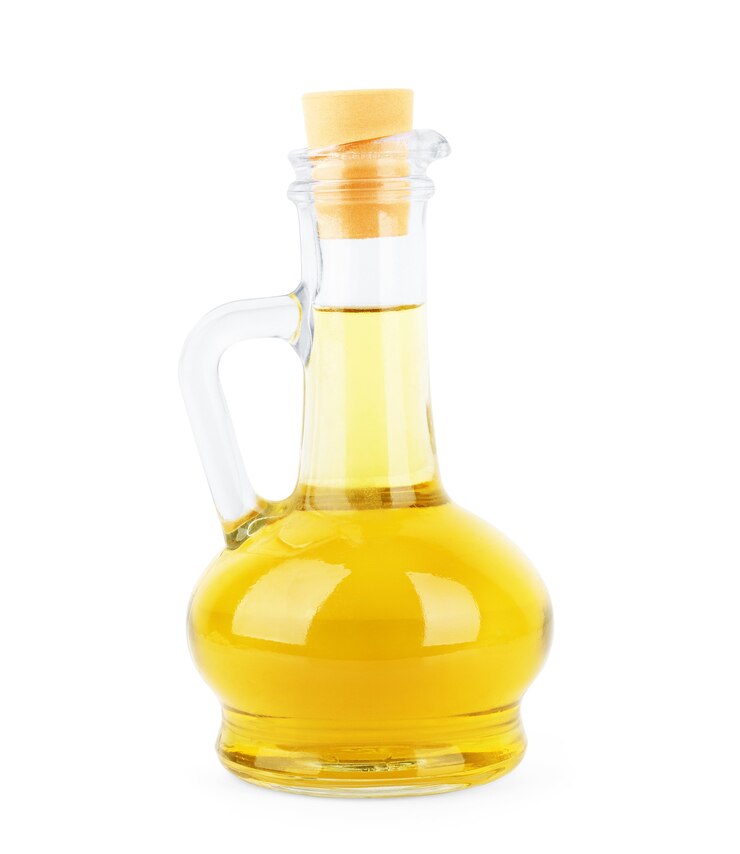 Foto vaso con olio isolato su bianco