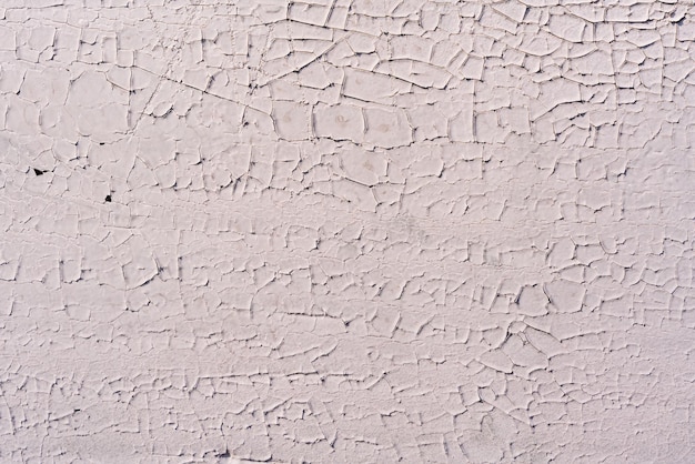 Vecchia vernice incrinata sul muro di cemento