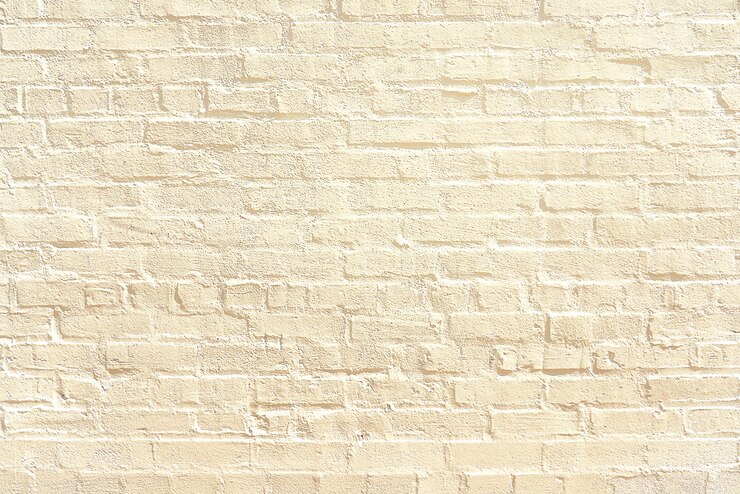 Foto vecchio fondo beige del muro di mattoni