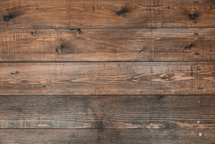 Vecchio fondo di legno marrone fatto di legno naturale scuro nella vista di stile del grunge dall'alto grezzo naturale