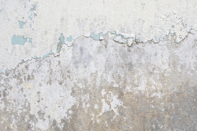 vecchio fondo di struttura del muro di cemento della vernice bianca