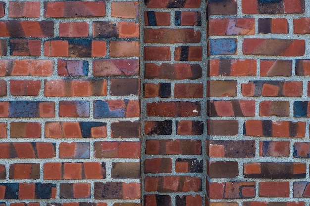 Vecchio fondo di struttura del muro di mattoni rosso