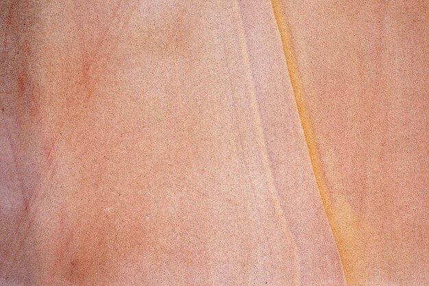 Vecchio fondo di struttura della parete di pietra della sabbia rossa. pavimento in pietra astratta