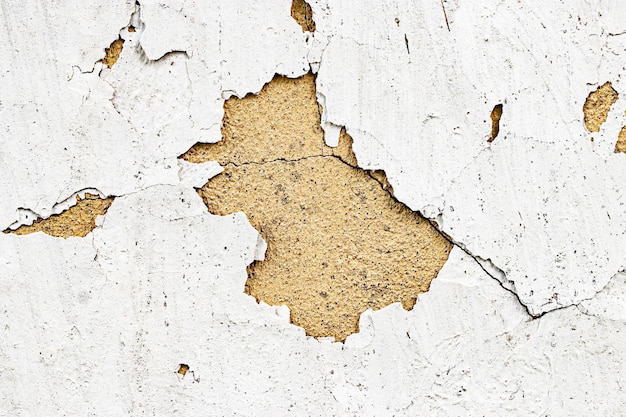 Vecchio intonaco distrutto Vecchio intonaco e stucco Edificio in rovina Stagnazione Sfondo per la progettazione L'influenza del tempo sulla struttura