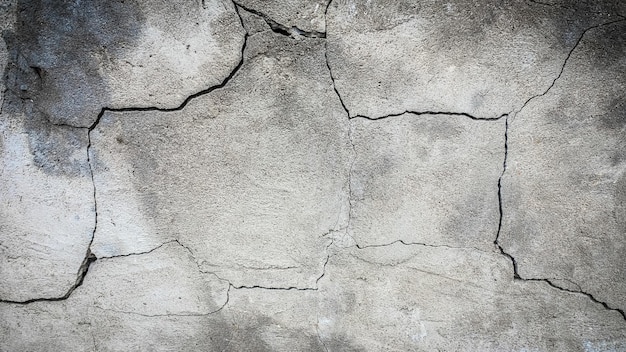 Vecchio muro di pietra con una crepa. trama per il design