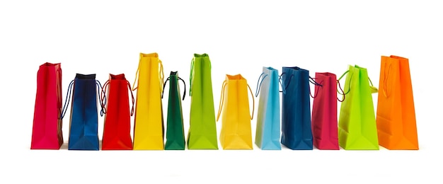 vendita, consumismo, pubblicità e concetto di vendita al dettaglio - molte borse della spesa colorate
